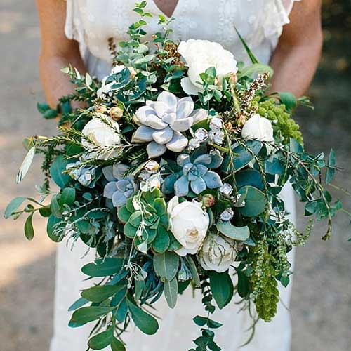 beautiful boho style bridal bouquet showcasing succulents