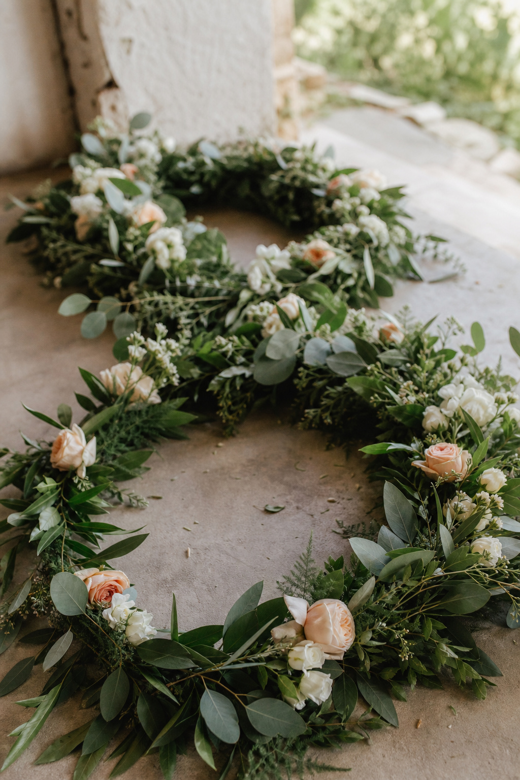 Finished garland resting in a cool shaded spot before being hung for an event