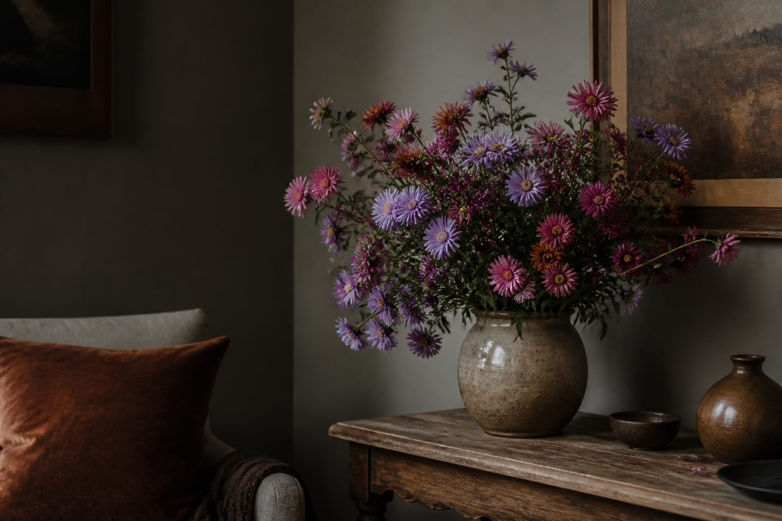 Vase of asters placed in a cool, shaded corner away from sunlight